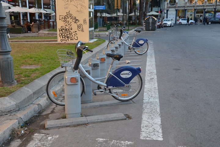 A row of Valenbisi hire bicycles docked at a street station