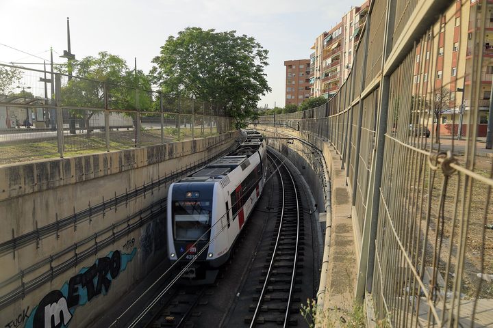 A Metrovalencia train on the line where it runs above ground